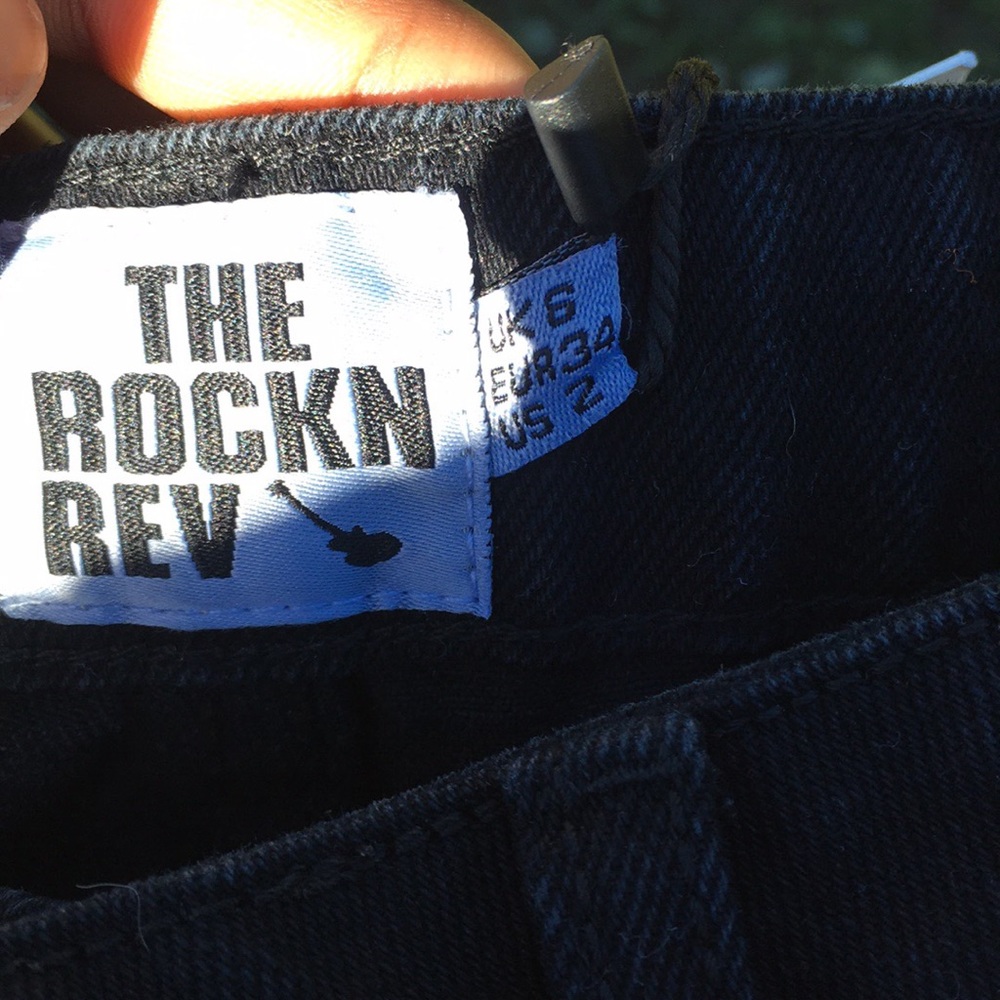 Black distressed mom jeans from booHoo